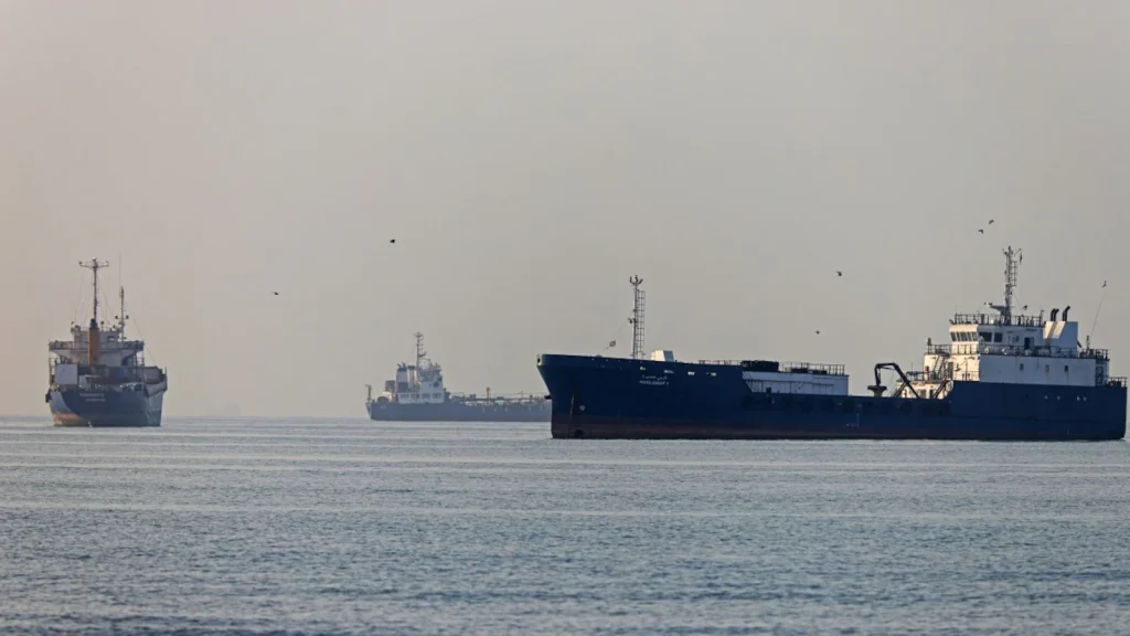 Iran said it had restarted talks with neighbor Oman to manage the Strait of Hormuz as it confronts