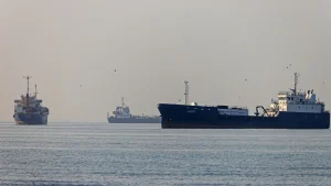 Iran said it had restarted talks with neighbor Oman to manage the Strait of Hormuz as it confronts
