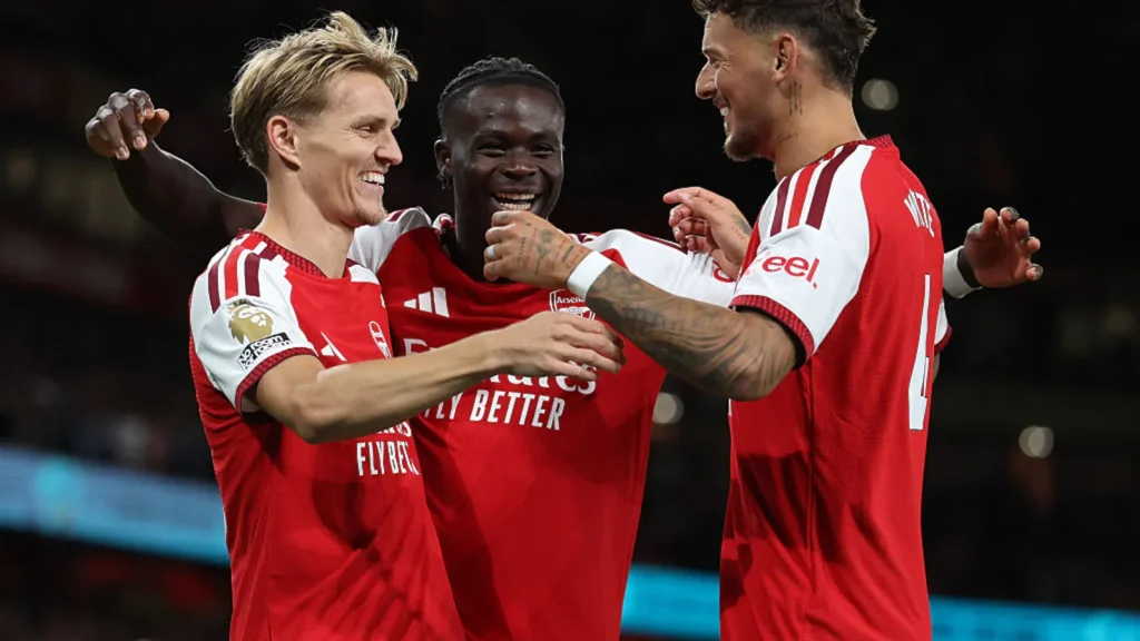 Arsenal made the perfect start to their Premier League title defence with a stylish 3-0 victory
