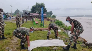 Nepal is poised to begin burying unidentified and unclaimed bodies recovered from recent flash