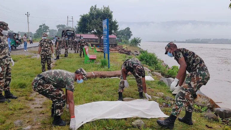 Nepal is poised to begin burying unidentified and unclaimed bodies recovered from recent flash