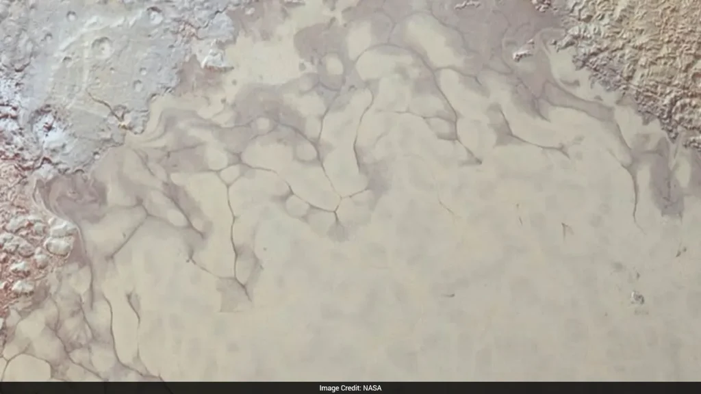 New findings suggest that liquid nitrogen from beneath the icy surface can rise through cracks and reach