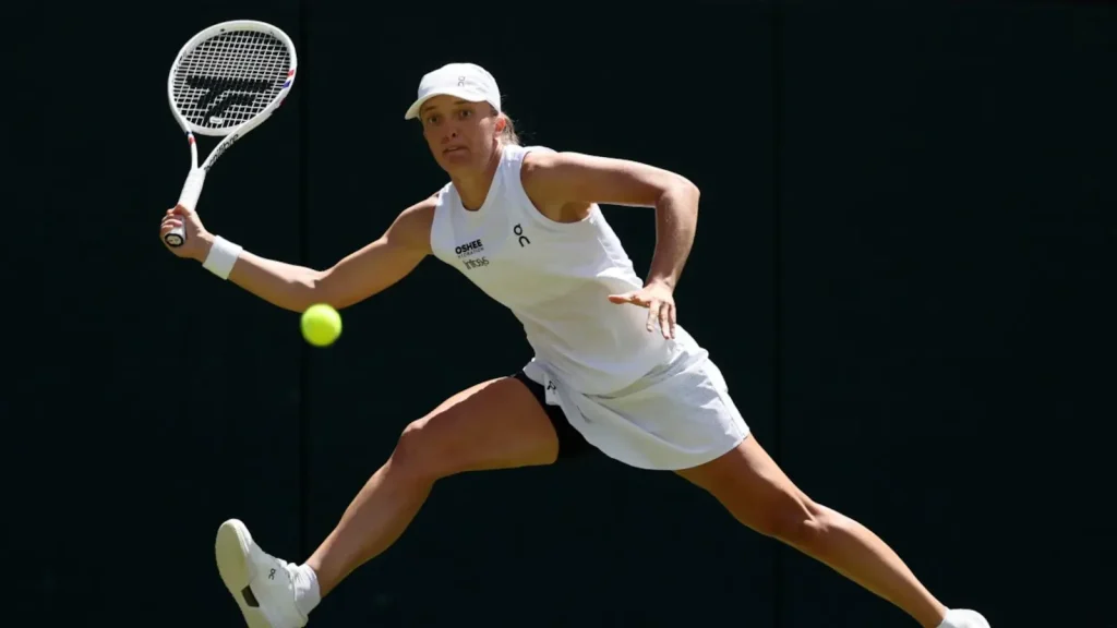 Iga Swiatek moved into the semi-finals of the ATP-WTA Cincinnati Masters as Elena Rybakina was forced