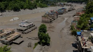 Nepal has reported a breach of a dam on the Tibetan side of the border, prompting authorities
