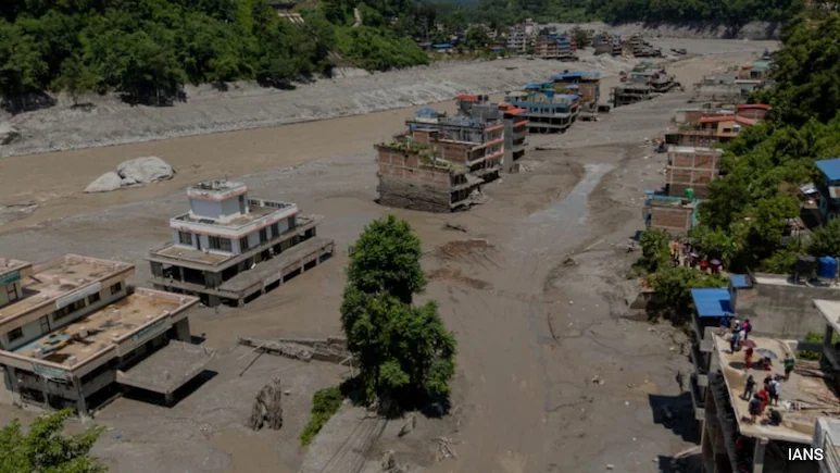 Nepal has reported a breach of a dam on the Tibetan side of the border, prompting authorities
