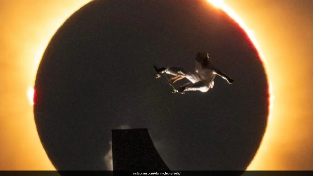 Olympic Skateboarder Times Perfect Jump With Solar Eclipse