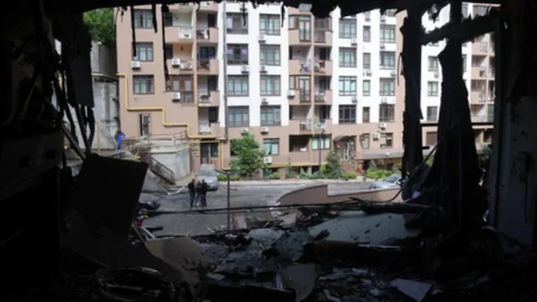 At least 27 people have died after a Russian drone struck a warehouse near Kyiv's western