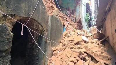 A 61-year-old woman died when a portion of a more than two-centuries-old building at Jorabagan in north