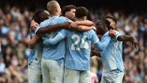 Manchester City went top of the Premier League despite Brian Brobbey's hat-trick in a 5-3