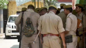 Two Uttar Pradesh Police personnel and two CRPF personnel have been arrested for the alleged
