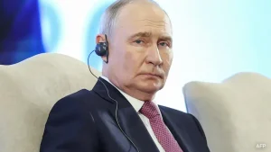 During his remarks, Putin criticized what he termed global economic coercion and condemned