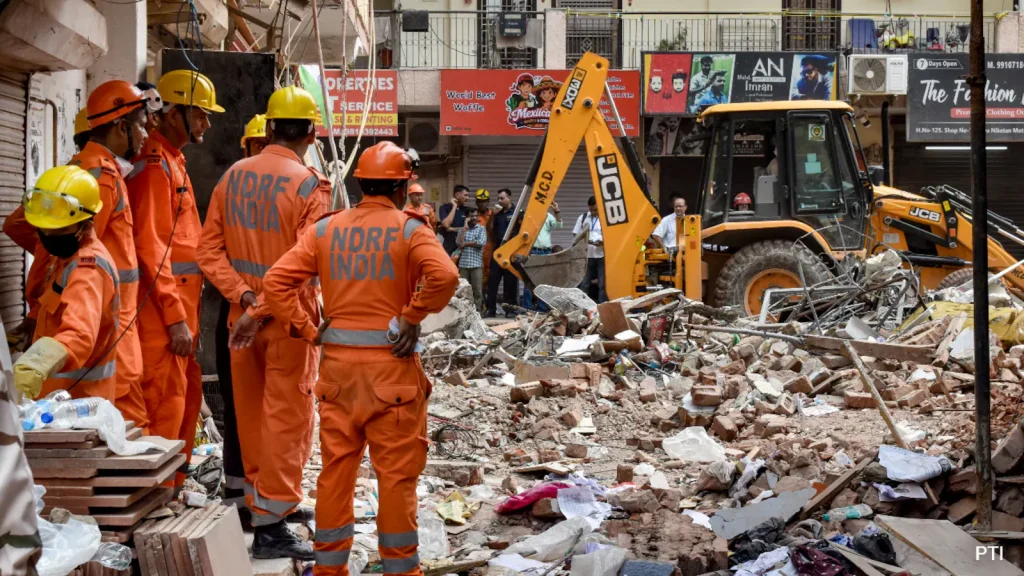 A five-storey building in Delhi's Satya Niketan came crashing down in seconds on Sunday