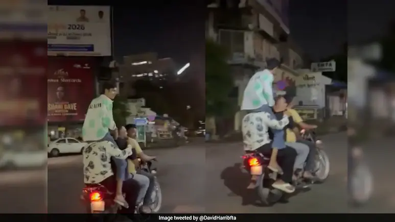 Man Rides On Another's Shoulders As 4 Cram Onto Bike In Ahmedabad, Stunt Caught On Camera