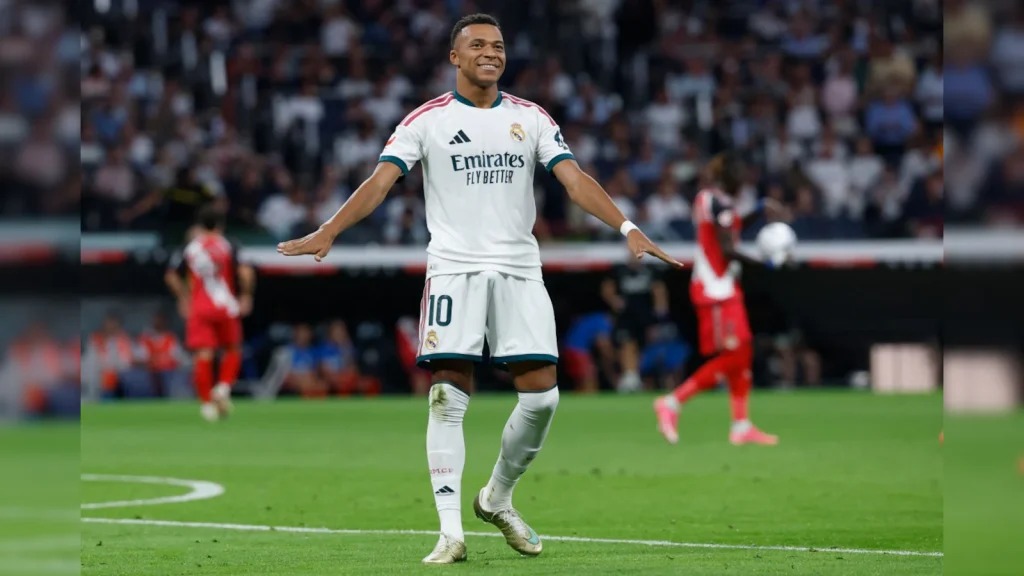 Kylian Mbappe struck twice to help Real Madrid smash Rayo Vallecano 4-1 on Saturday to pull
