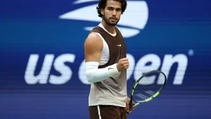 Defending champion Carlos Alcaraz will be under the microscope again on Sunday taking