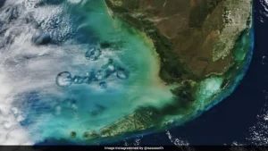 NASA Shares Pic Of Odd Holes In Clouds
