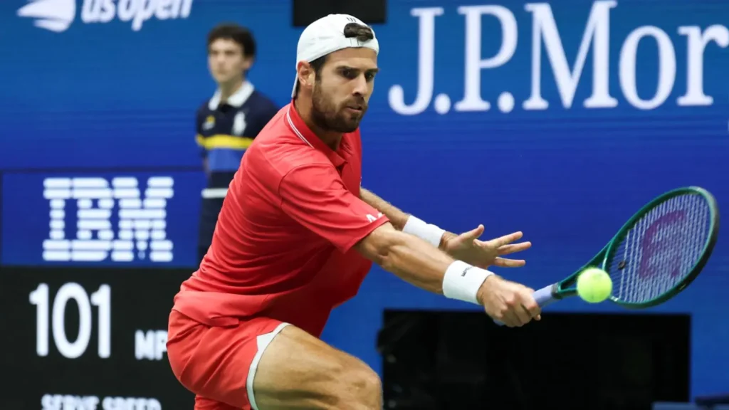 Karen Khachanov punched his ticket the US Open semi-finals on Wednesday, advancing when Belgian