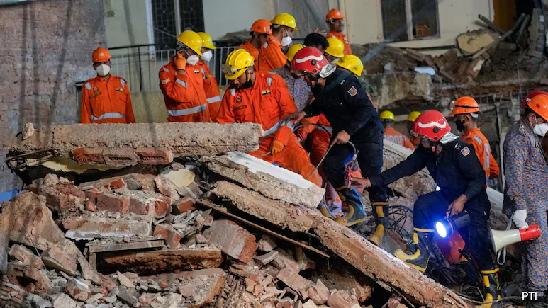As Rescuers Dig Through Rubble In Delhi, Another Building Worries Officials