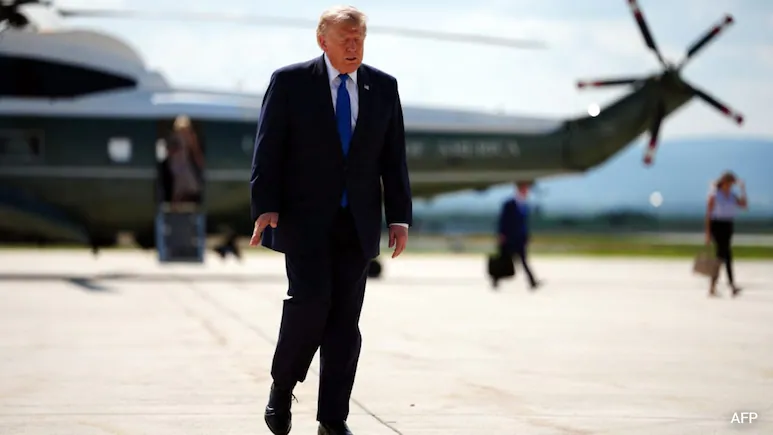 US President Donald Trump cut short a weekend at Camp David to return unexpectedly to the White