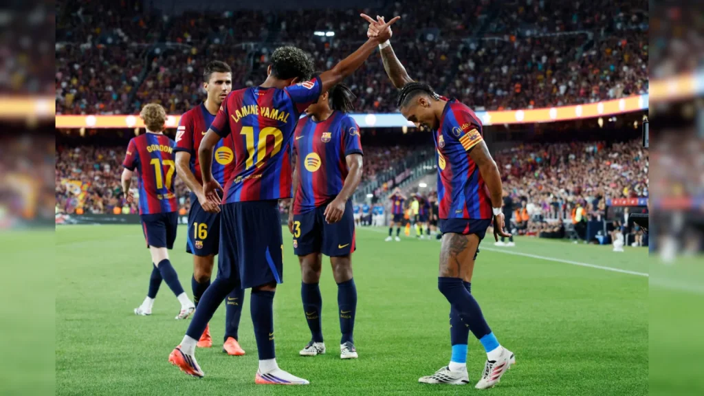 Barcelona's teenage star Lamine Yamal and Raphinha both struck twice as the champions beat Rayo