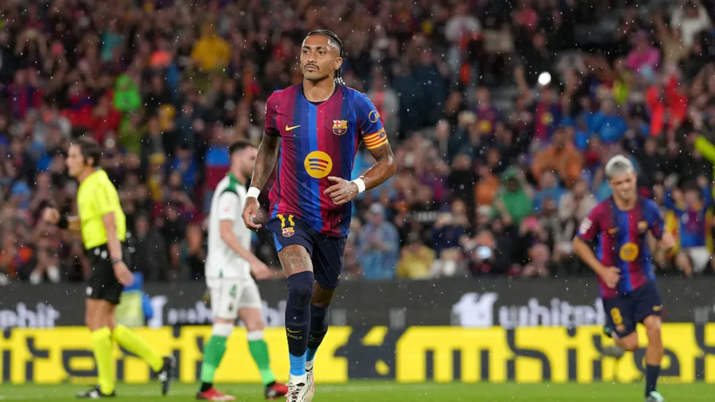 Raphinha scored a hat-trick as La Liga leaders Barcelona ripped Racing Santander to shreds