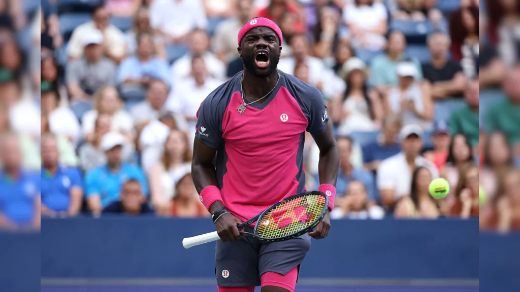 American Frances Tiafoe swept past former champion Daniil Medvedev in straight sets Sunday