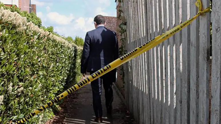 Gunmen killed at least 27 people in two mass shootings in South Africa's two main cities