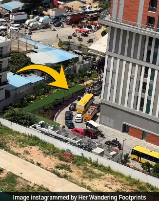 From her room, the woman first filmed the traffic on the road before zooming in on a line