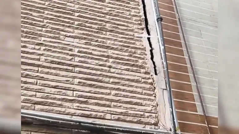 Panic gripped Delhi's Gandhi Nagar area after a four-storey building suddenly tilted, raising