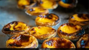 Chinese Restaurant Sparks Buzz With Egg Tarts Topped With 'Giant Cockroaches'