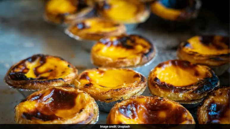 Chinese Restaurant Sparks Buzz With Egg Tarts Topped With 'Giant Cockroaches'