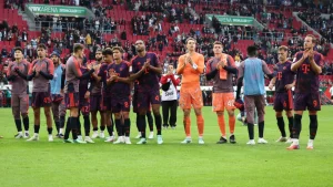 Bayern Munich twice came from behind to draw 2-2 at Augsburg on Saturday after a mistake