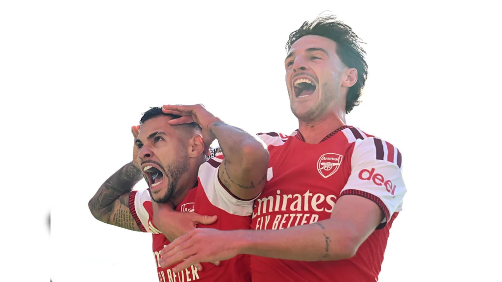 Arsenal got back on track as the Premier League champions survived a scare to beat Leeds 2-1