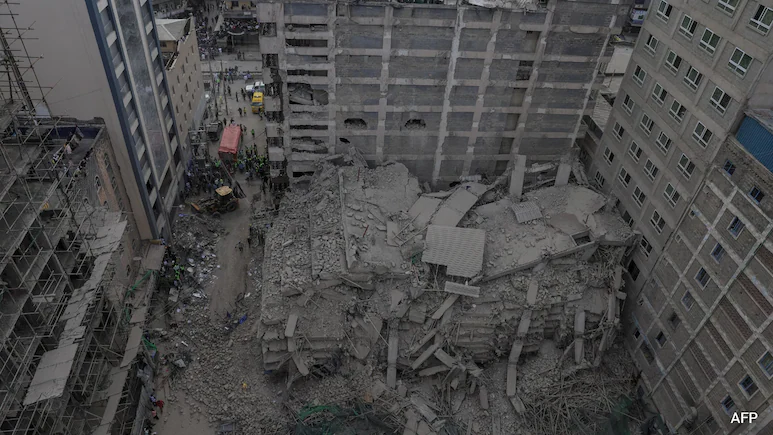 Many people were feared trapped as a tall building collapsed Friday in Kenya's capital, leaving