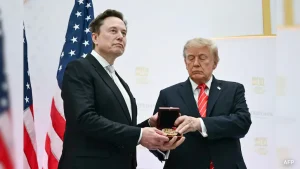 Donald Trump presented Elon Musk with the top US science medal on Thursday, as the rocket