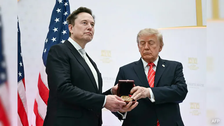 Donald Trump presented Elon Musk with the top US science medal on Thursday, as the rocket