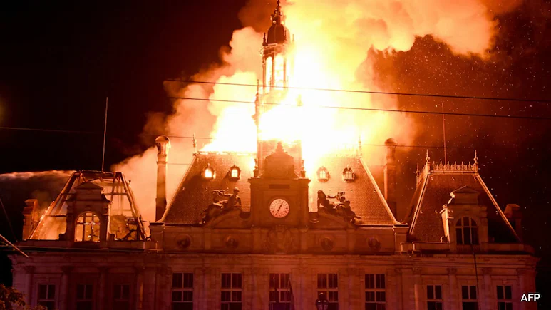 Clashes between police and protesters, massive looting and multiple blazes gripped France