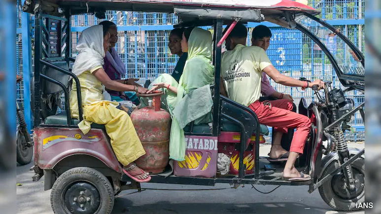 Delhi's 2014 e-rickshaw scheme already barred overcrowding and passengers sharing the driver's