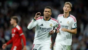 Kylian Mbappe scored a beautiful goal and converted a penalty kick to help Real Madrid beat