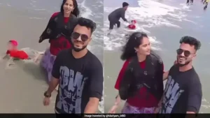 Video: Couple Films Beach Reel As Toddler Struggles In Waves, Stranger Steps