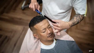From precise haircuts to sharp suits, many mobsters try to project an image of menace