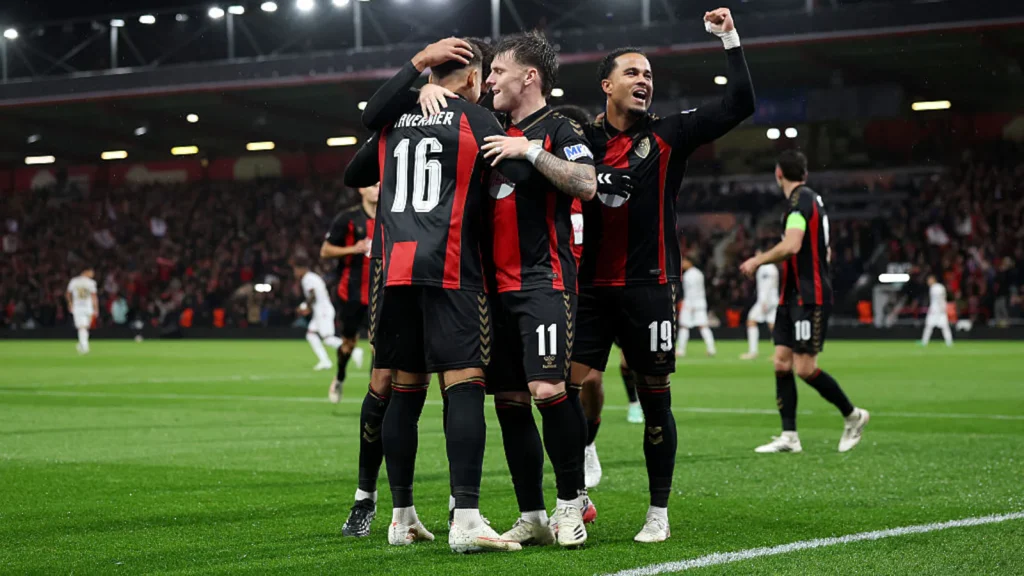 Bournemouth pulled off a sensational 3-0 home victory over 10-man AC Milan on Thursday to make