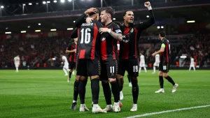 Bournemouth pulled off a sensational 3-0 home victory over 10-man AC Milan on Thursday to make