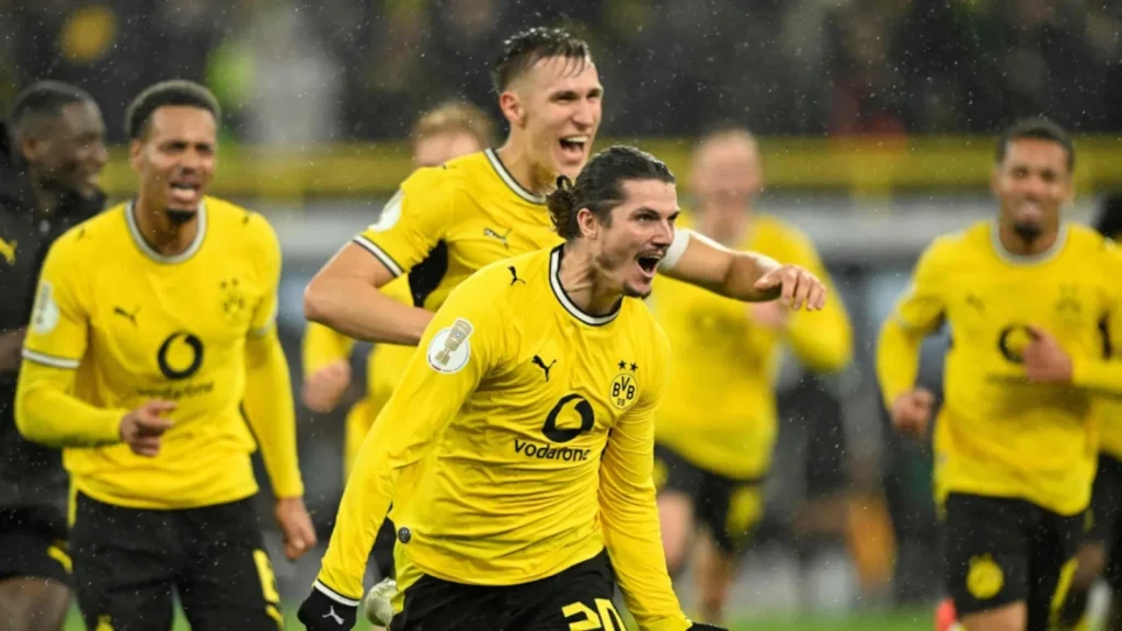 Marcel Sabitzer scored deep into stoppage time as Borussia Dortmund fought off Werder Bremen