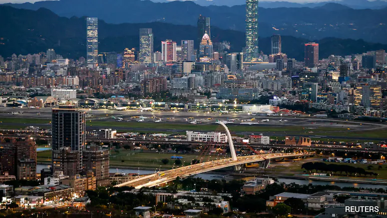 US President Donald Trump has downplayed the likelihood of a Chinese invasion of Taiwan