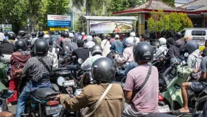 Hundreds of people protested a petrol shortage that authorities have blamed on supply
