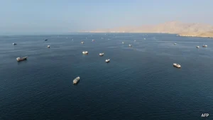 Iran's Revolutionary Guards said Monday an oil tanker caught fire in the Strait of Hormuz