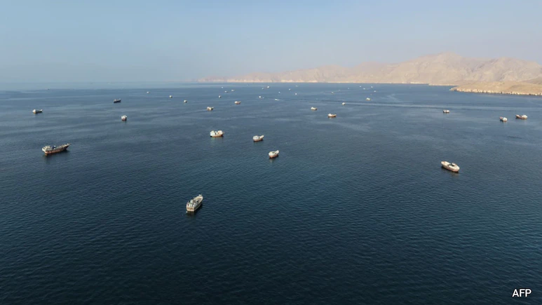 Iran's Revolutionary Guards said Monday an oil tanker caught fire in the Strait of Hormuz