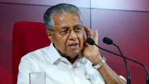 One FIR relates to alleged bribes to Vijayan through his daughter and the other to money