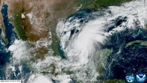 Isaias had maximum sustained winds of 105 mph (165 kph), according to the hurricane center